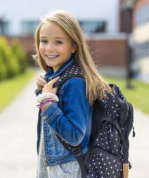 Elève en primaire en pré-rentrée scolaire avec Institut Molière